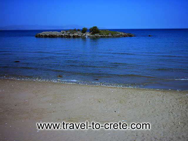 AKROTIRI STAVROS - The islet across the beach