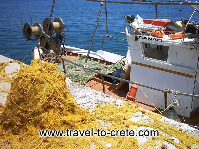 KOLYMPARI - A fishing boat and nets in Kolympari port