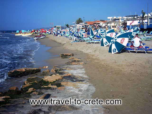 MALIA - A crowded part of the beach, where the water sports take place