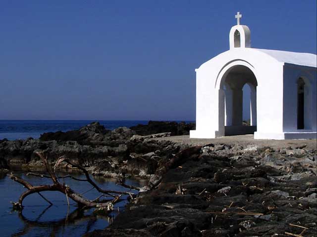 A Chapel - Near the harbour of Georgioupolis (small town in northern Crete) is located the small rocky island with the chapel of St. Nicolas. It is said that St.Nicolas protects the fishermen and gives them strength to do their hard work. 
