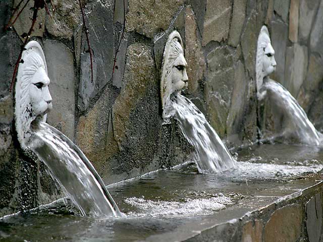 Fountain - This is an unusual fountain with 19 lion heads in a row spitting out water in Rethymno Spili. It seemed to be fed by a stream but I wan't able to tell for sure. by joshua bortman