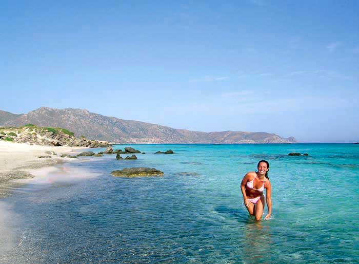 GIRL AT ELAFONISSI - A beautiful girl at Elafonissi beach