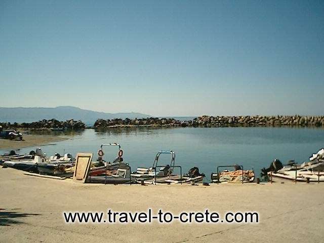 Platanias Village is situated on the western part of Crete just 10 kilometers from the City of Chania. It is an attractive holiday resort with quality hotels, excellent services and breathtaking sceneries and of course soft sandy beaches. Here you can wa CRETE PHOTO GALLERY - PLATANIAS SMALL FISHING HARBOUR