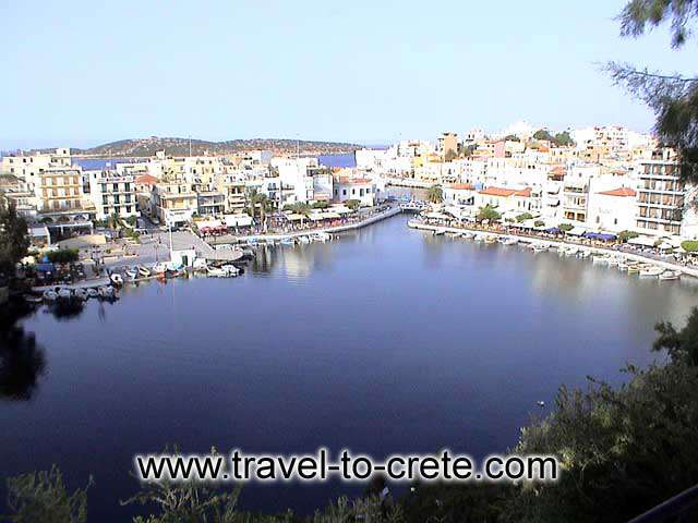 View from above. The town center of Agias Nikolaos is a deep lake (deep enough for the retreating Germans to dump all their tanks during WWII, and nobody has seen them since and actually is not a lake because it is connected to the sea. CRETE PHOTO GALLERY - AGIOS NIKOLAOS