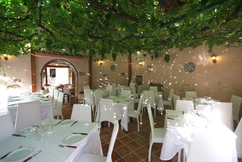 The inside view of Old Village Restaurant with the fire place