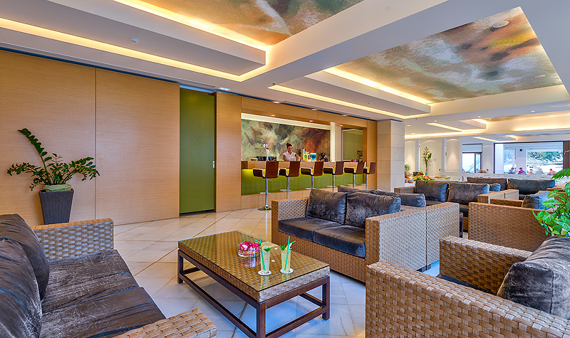 The living room and the bar  of Geraniotis beach Hotel