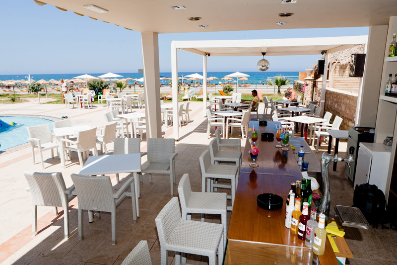 The bar of Dimitrios Village is next to the sandy beach CLICK TO ENLARGE