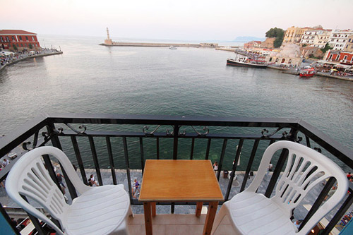 The balcony of Loukia Hotel is viewing to the old graphic Venetian port of Hania - Crete
