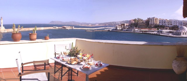 From the roof garden Casa Leone Hotel you can enjoy the wonderful view towards the old graphic Venetian port of Hania - Crete