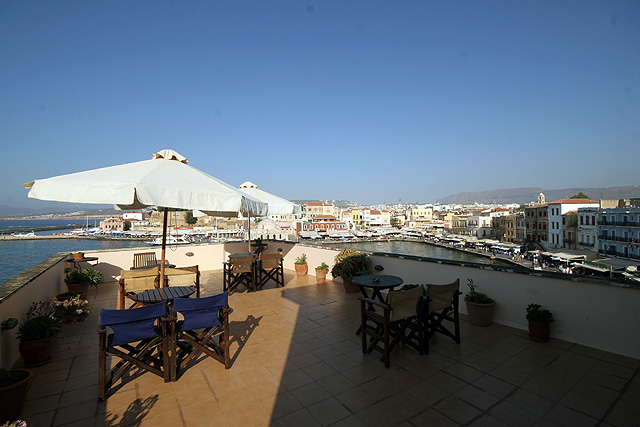 The veranda of Aphora Hotel next to the roof garden viewing to the old Venetian port of Hania CLICK TO ENLARGE