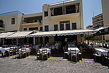 The outside view of Apostolis Fish restaurant in old graphic little Venetian port of Hania - Crete