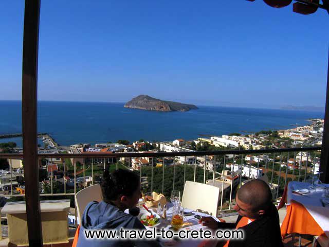 The atmosphere is very romantic with wonderful view of Platanias village and the little island of Theodorou CLICK TO ENLARGE